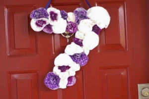 Purple Polka Dot Carnival Birthday Party Decor | DIY Cupcake Wrapper Wreath| missfrugalfancypants.com
