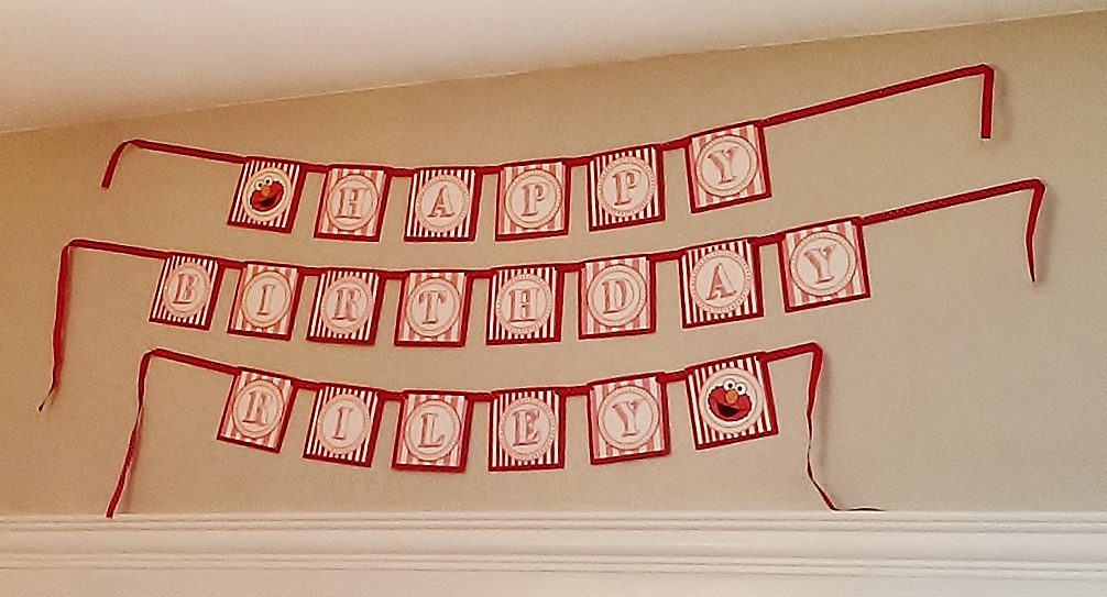 Pink & Red Elmo Birthday Party Decor with DIY Banner| missfrugalfancypants.com