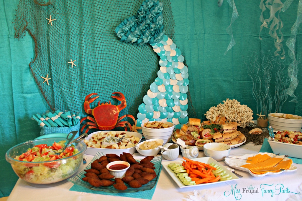 Little Mermaid Under the Sea 1st Birthday Party Decor with DIY Jellyfish & Mermaid Tail | missfrugalfancypants.com